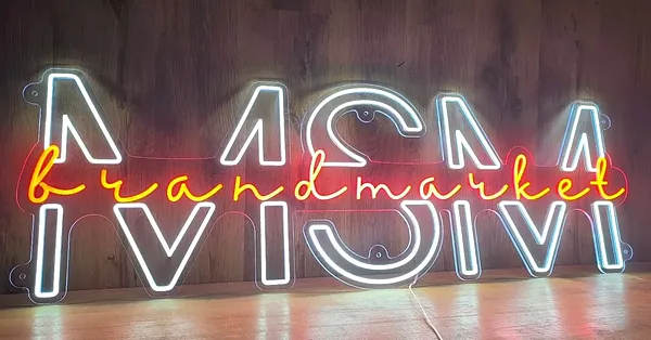 LED neon sign in 2 colors: cool white + orange, logo for a 
shop,&nbsp;base shaped to the lettering: transparent solid polycarbonate 
6mm.&nbsp;